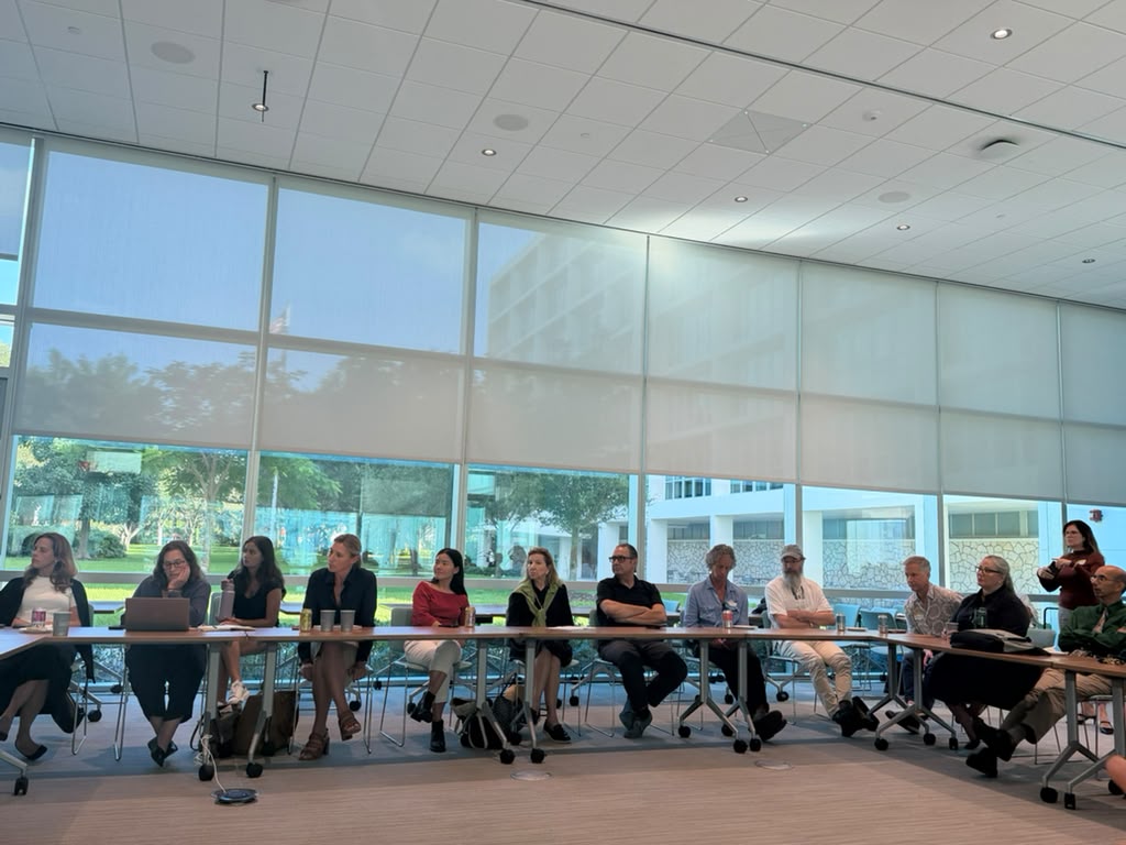 Internal Advisory Committee members seated around a meeting table